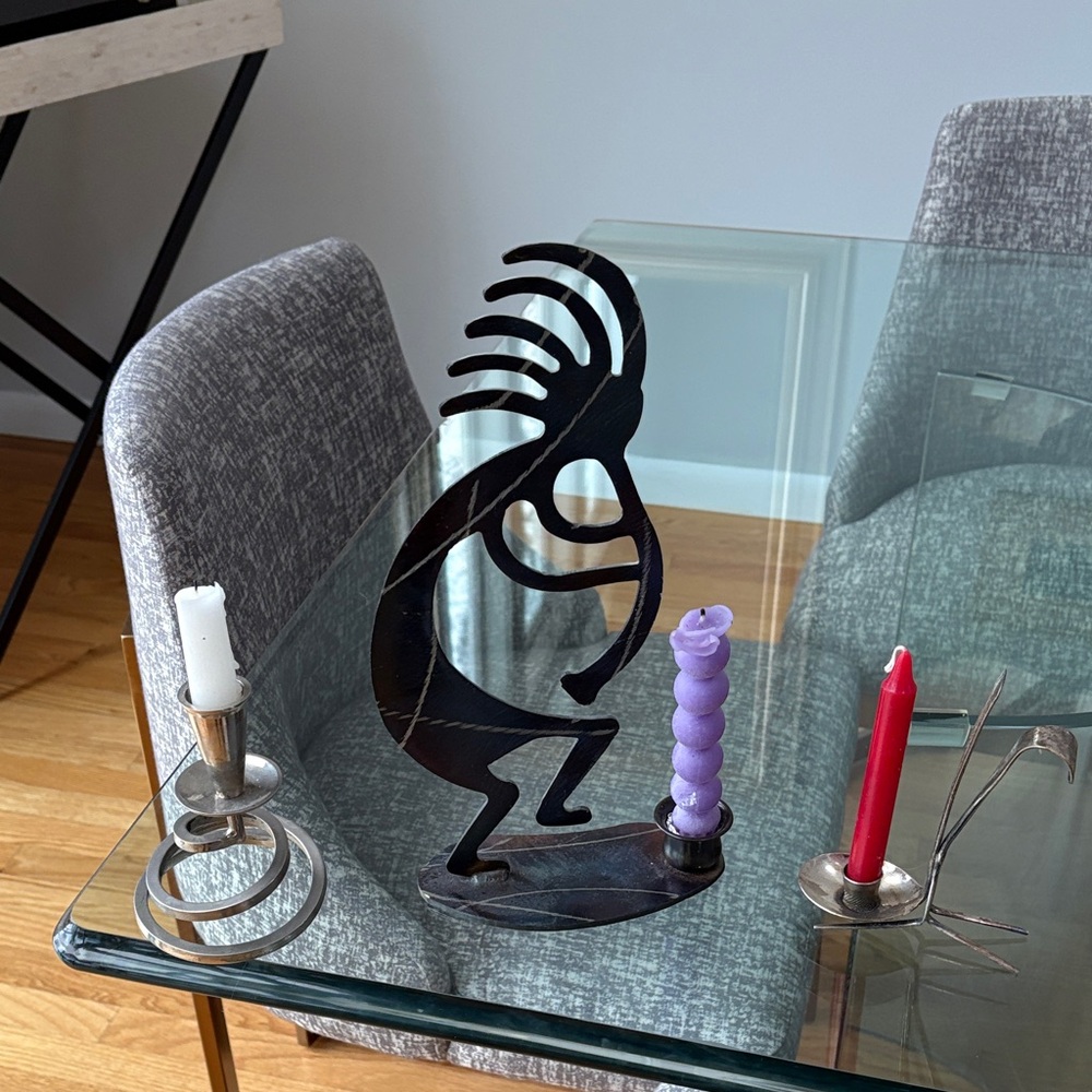Black Metal Kokopelli and two silver, vintage candle holders.Beautiful pieces.